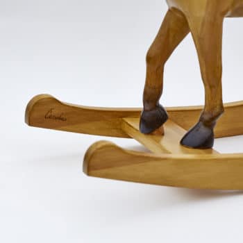 Middle sized wooden rocking horse, tan colors