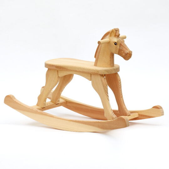 Medium Rocking horse mad of pine wood with natural surface finish and painted eye